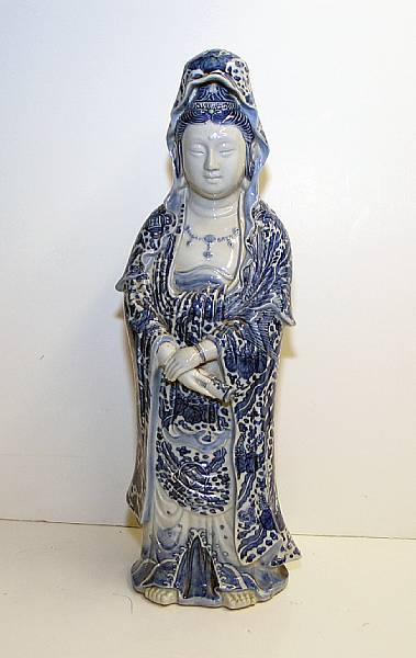 Appraisal: A Japanese blue and white porcelain standing Kannon The bare-footed