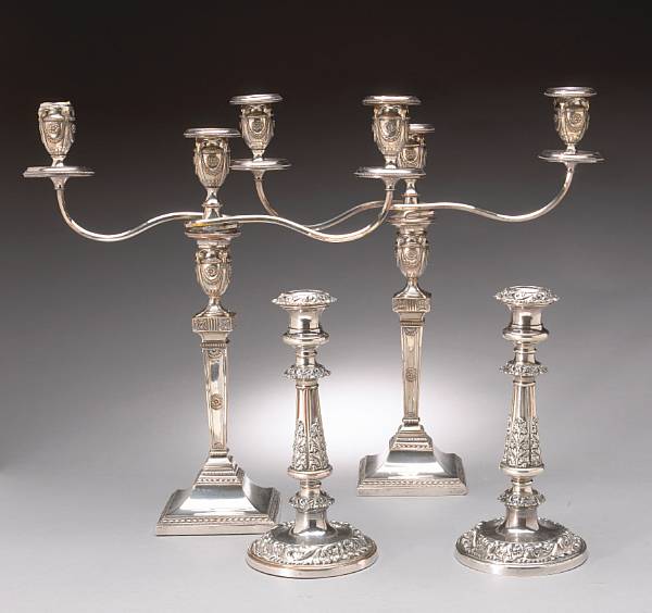 Appraisal: A plated group of pairs of candlesticks and candelabra Comprising