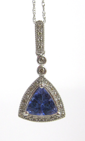 Appraisal: TANZANITE AND DIAMOND PENDANT NECKLACE suspended on an inch k