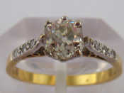 Appraisal: A yellow metal tests carat gold diamond solitaire ring with