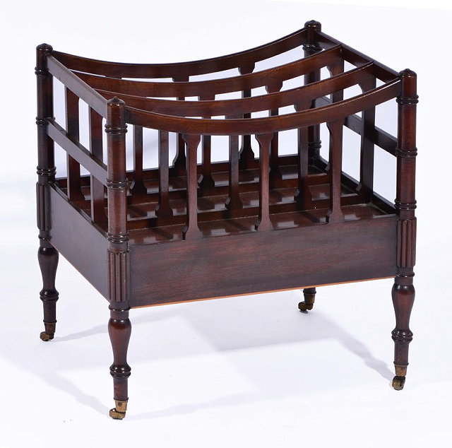 Appraisal: A GEORGIAN STYLE MAHOGANY MUSIC CANTERBURY with reeded corners standing