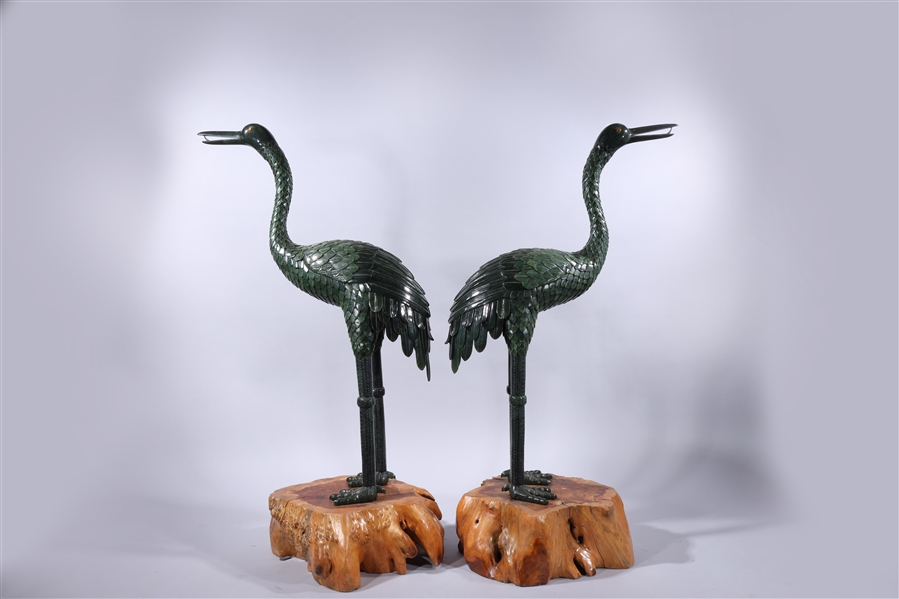 Appraisal: Pair of large Chinese sectional spinach jade models of cranes