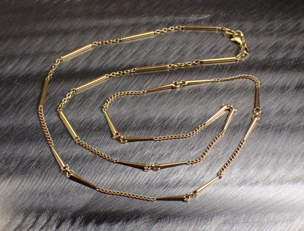 Appraisal: EIGHTEEN KARAT YELLOW GOLD CHAIN NECKLACE with sections of curb