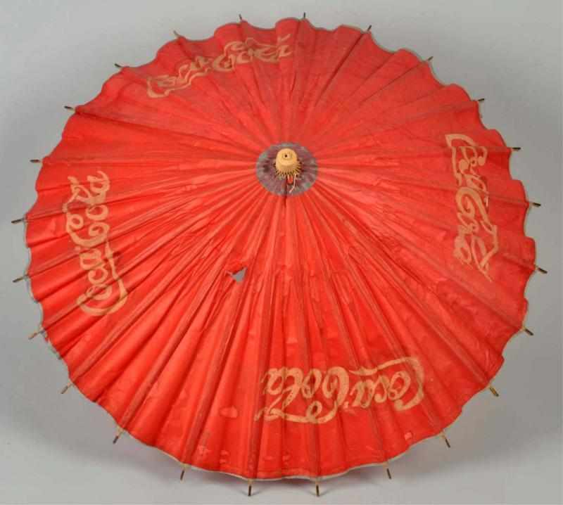 Appraisal: Bamboo Paper Coca-Cola Umbrella Used with the cardboard cutout window