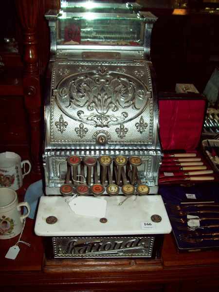 Appraisal: A MID VICTORIAN MINIATURE NATIONAL CASH REGISTER