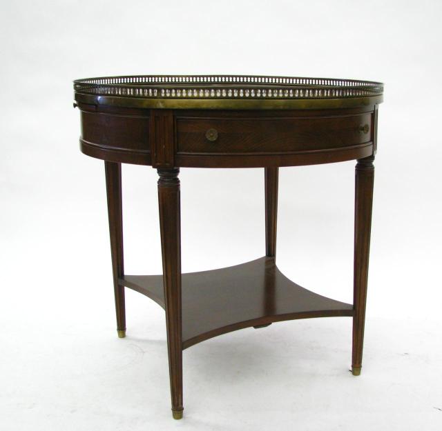 Appraisal: Vintage Mahogany Drum Table with brass gallery fluted legs drink