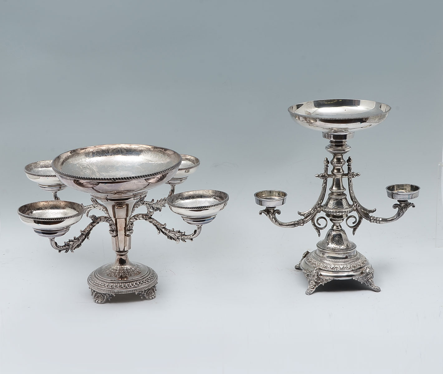 Appraisal: VICTORIAN SILVER PLATE EPERGNES - Sheffield England silver plated epergnes