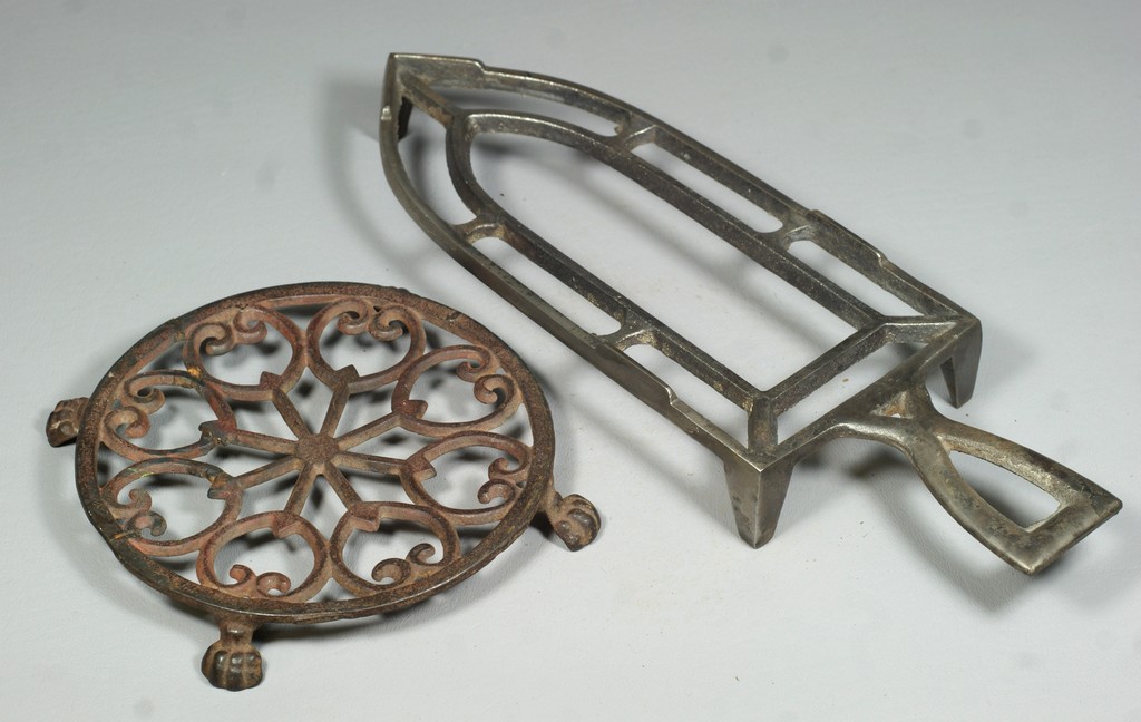 Appraisal: cast metal trivets largest measuring long