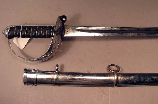 Appraisal: A reproduction British officer's sword The inch blade with faux