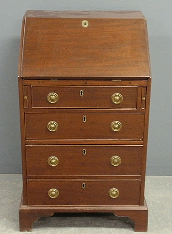 Appraisal: - Diminutive Chippendale style mahogany slant-lid desk h x w