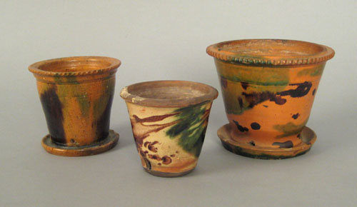 Appraisal: Three Shenandoah Valley redware flowerpots th c with mottled green