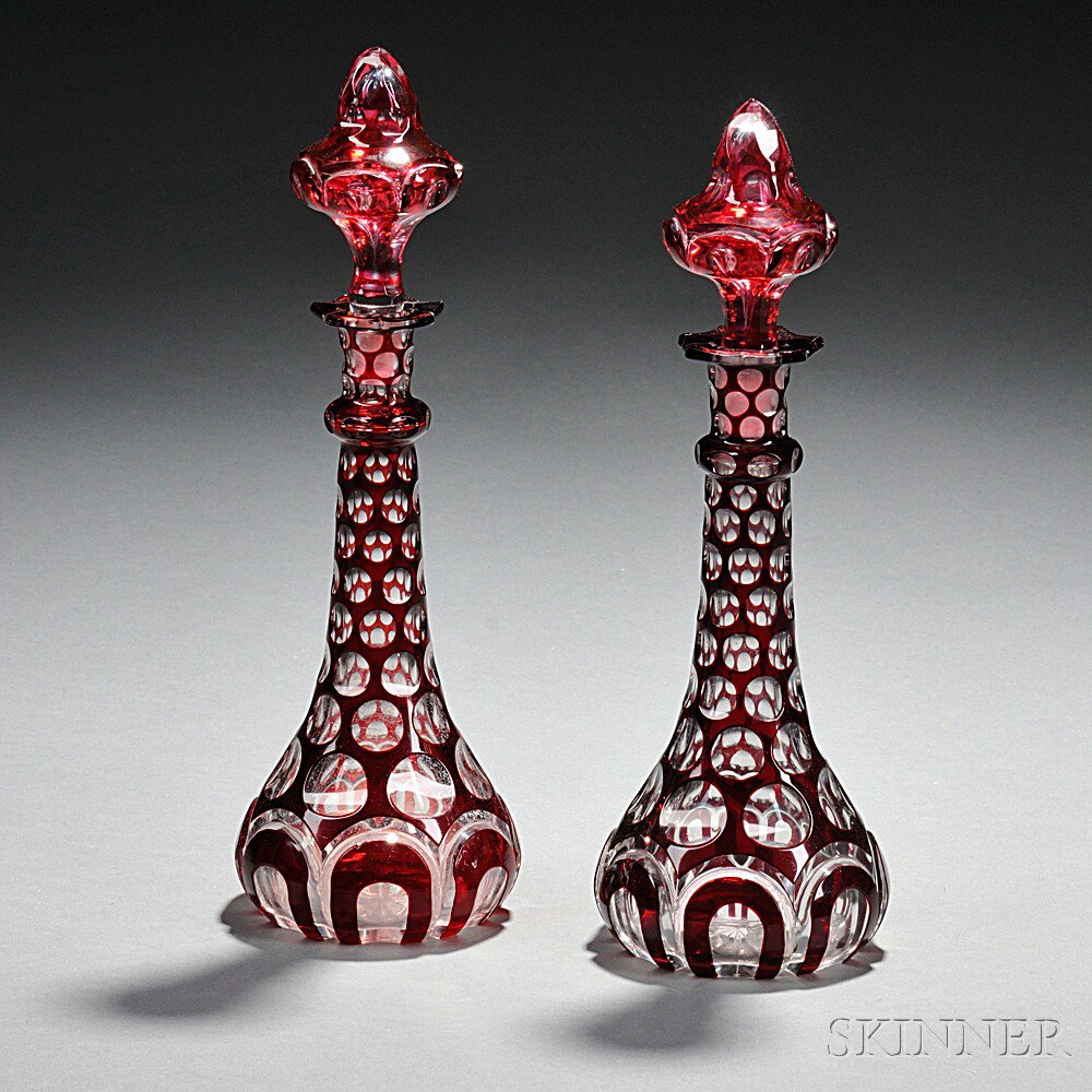 Appraisal: Two Ruby Cut-to-Clear Glass Cruets late th early th century