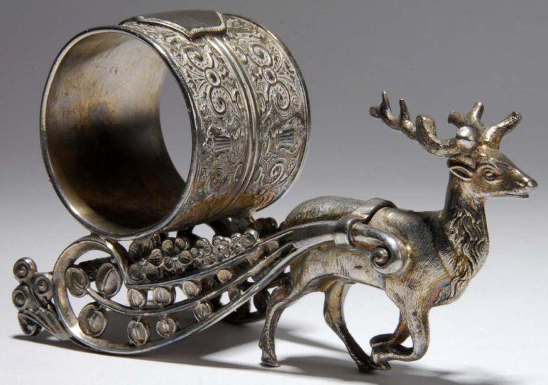 Appraisal: Deer Pulling Napkin Ring Description Deer pulls a beautiful graceful