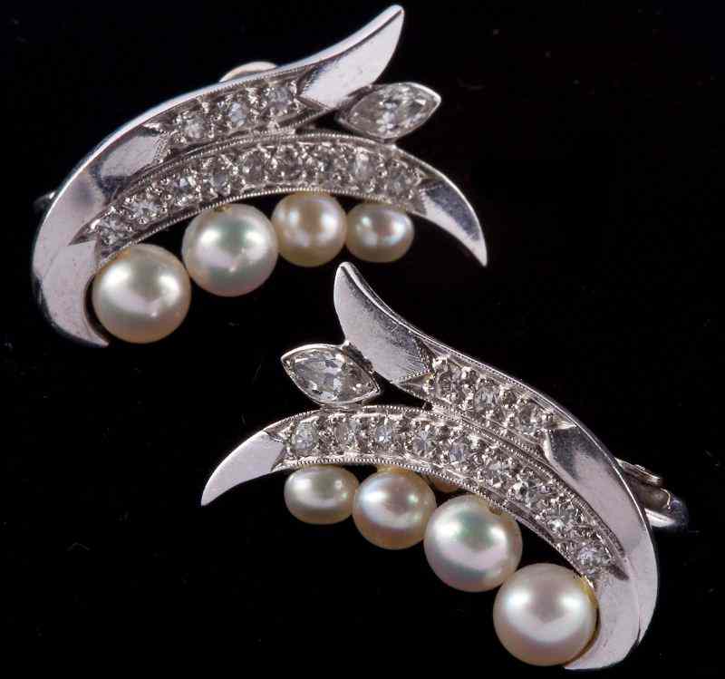 Appraisal: Pair of Pearl and Diamond Earclipsof vertical leaf form each