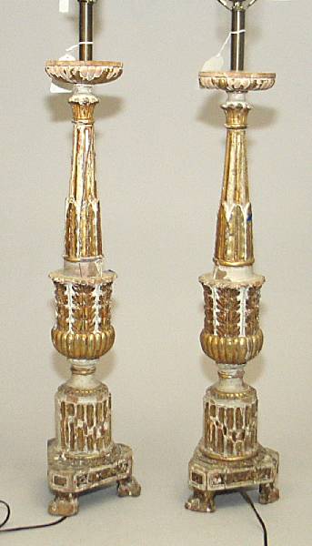 Appraisal: A pair of Italian Neoclassical painted and parcel gilt candle