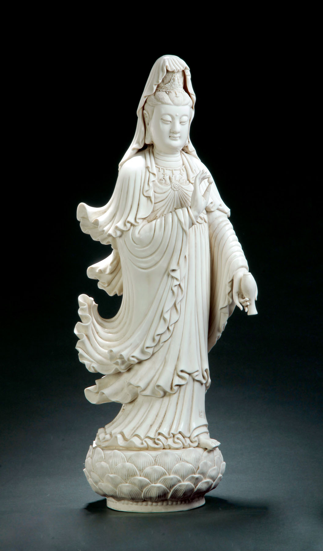 Appraisal: BLANC DE CHINE FIGURE China early th century Robed Quanyin