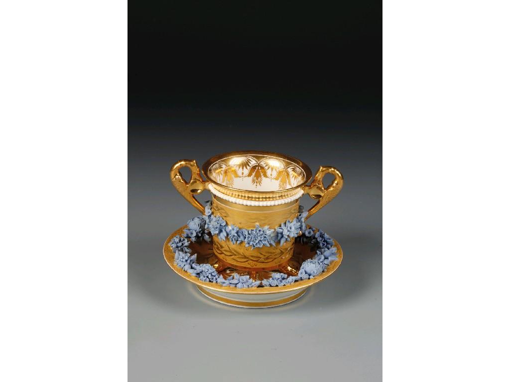 Appraisal: A DERBY CUP AND SAUCER the gilt ground with leaf