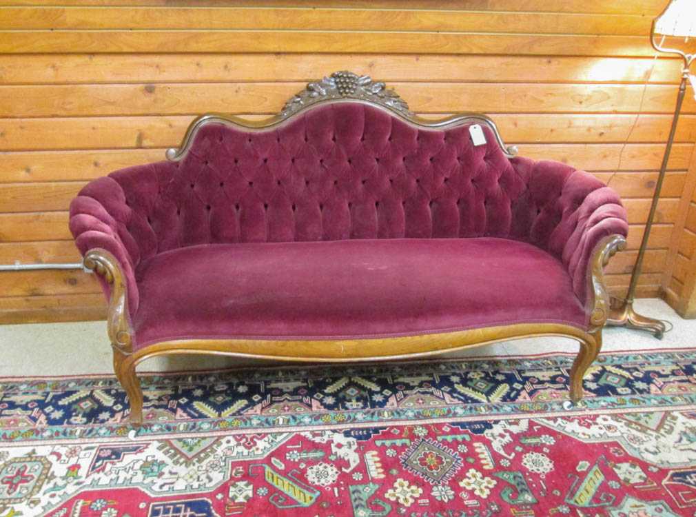 Appraisal: A VICTORIAN STYLE SOFA American early th century having a