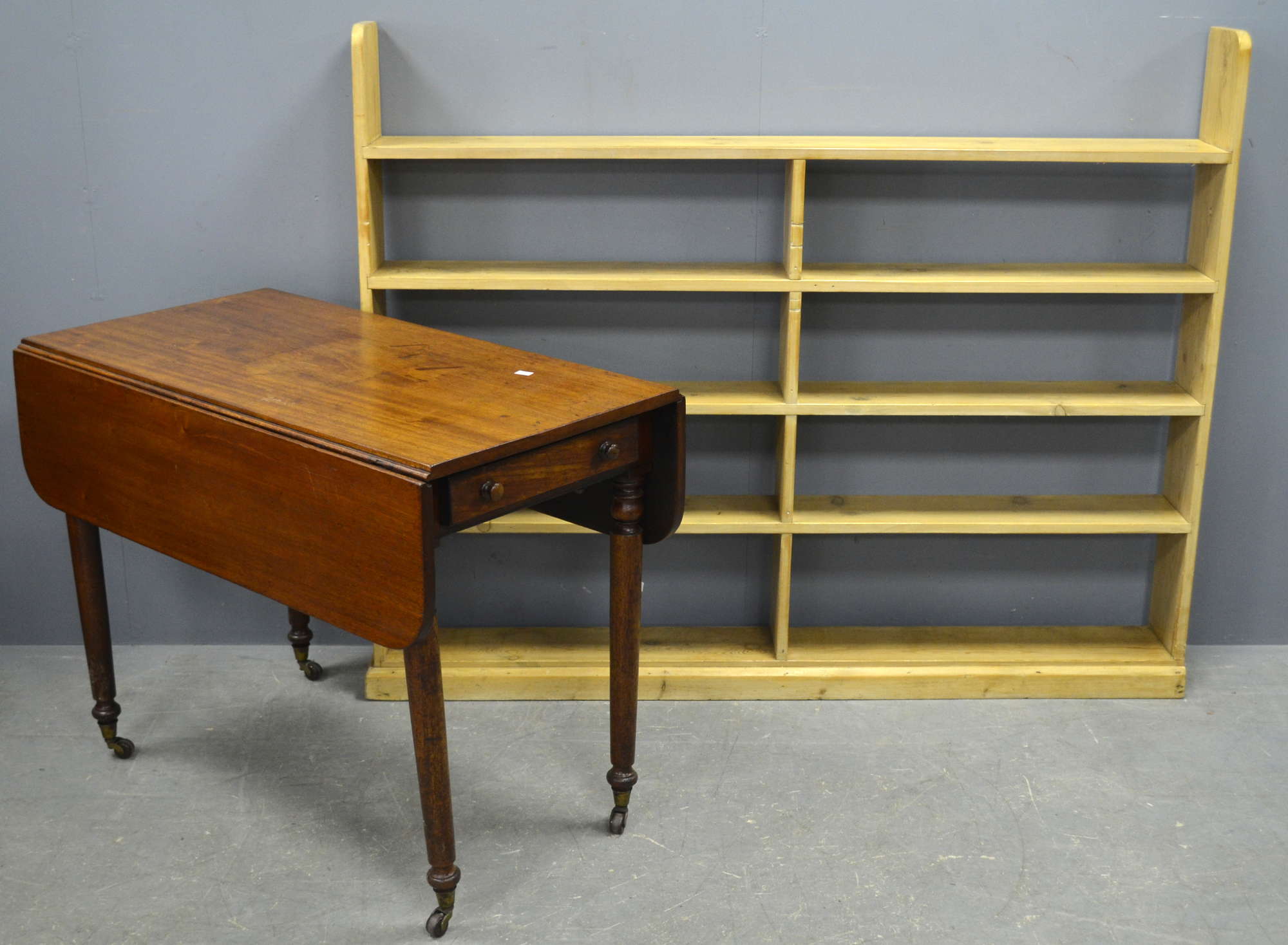 Appraisal: Pine open bookcase and a mahogany pembroke table