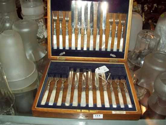 Appraisal: A SET OF FRUIT KNIVES AND FORKS WITH MOTHER OF