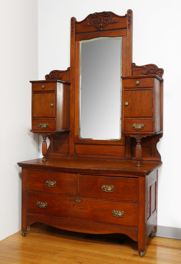 Appraisal: AMERICAN OAK DOUBLE BONNET TOP DRESSER Early 's oak dresser