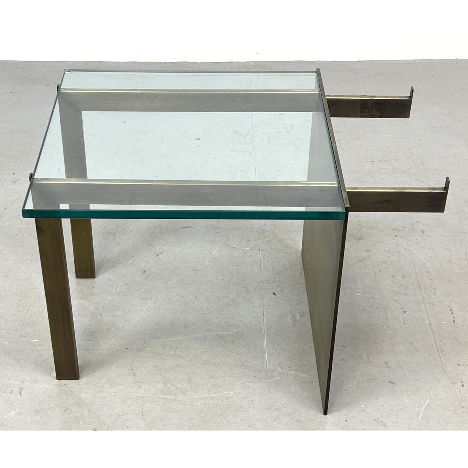 Appraisal: Modernist Glass And Metal Coffee Table Extended arms missing small