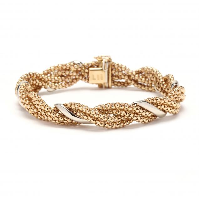 Appraisal: Bi-Color Gold Bracelet Foro Designed with high polish yellow gold