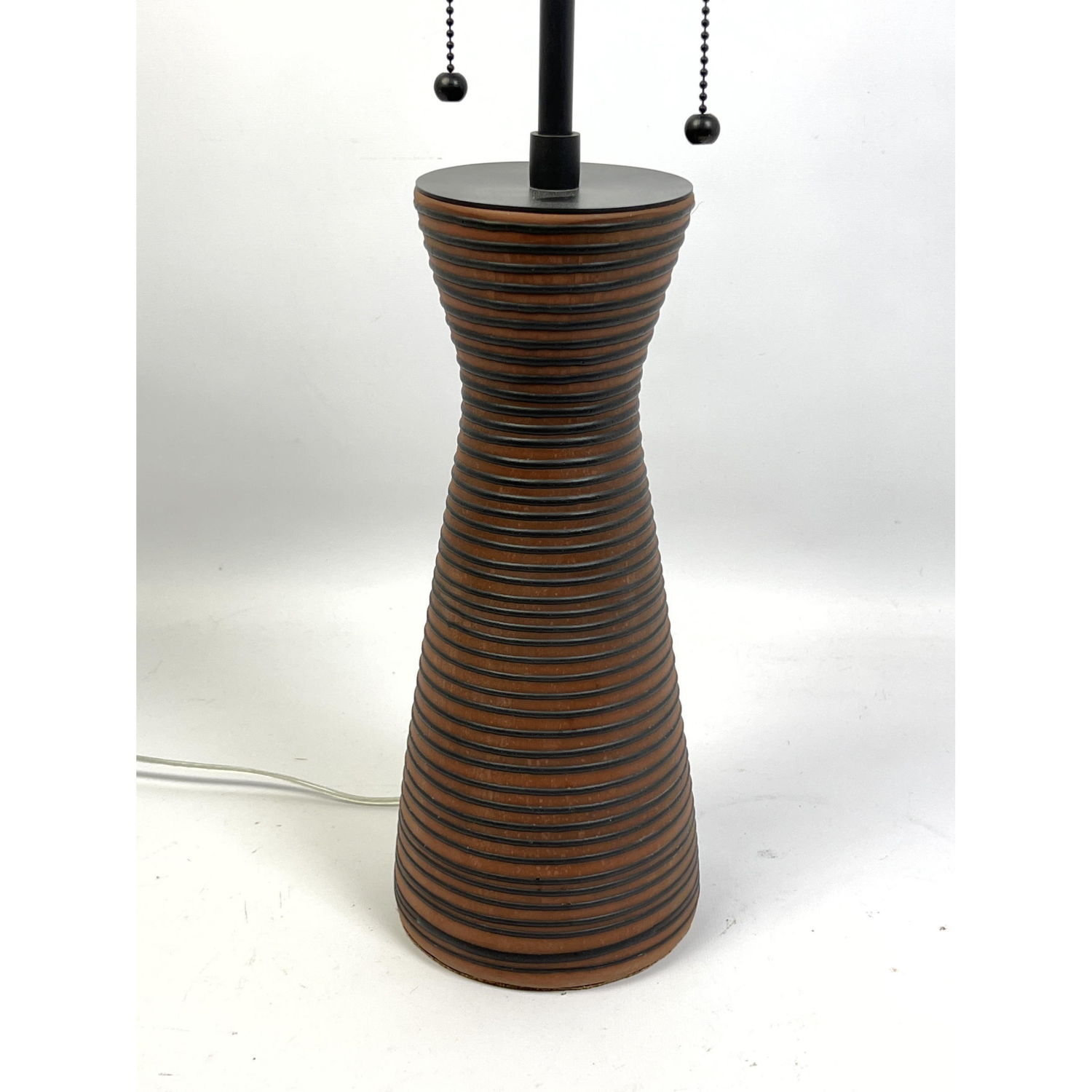 Appraisal: Corseted Brown and Black Striped Pottery lamp Scandinavia or Italian