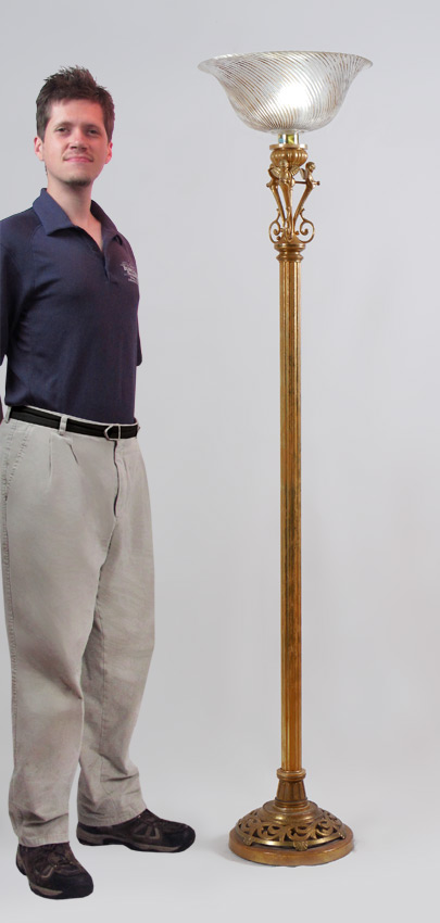 Appraisal: DECORATIVE FIGURAL CHERUB FLOOR LAMP Lamp with antiqued finish brass