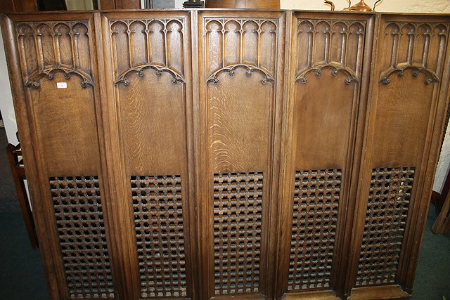 Appraisal: A CARVED OAK ROOD SCREEN with Gothic style carved arched