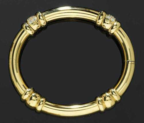 Appraisal: BRILLANT-CUT DIAMOND AND GOLD BANGLE Yellow gold g Casual bangle