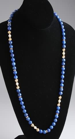 Appraisal: Strand of lapis and gold beads stamped K Measuring mm