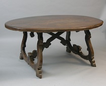 Appraisal: A Dark Oak Oval Dining Table A dark oak oval