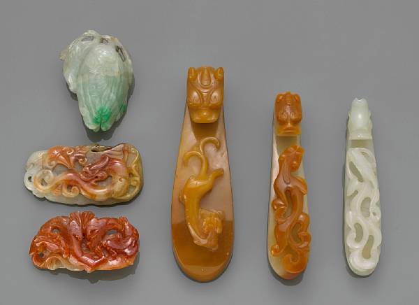 Appraisal: A group of six jade and carnelian carvings th Century