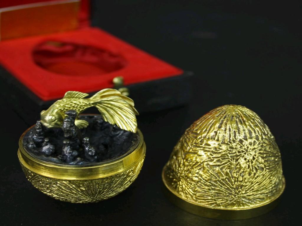 Appraisal: Stuart Devlin silver-gilt Easter egg limited edition the abstractly engraved