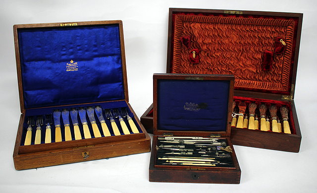 Appraisal: A CASED PART SET OF SILVER PLATED FISH KNIVES AND