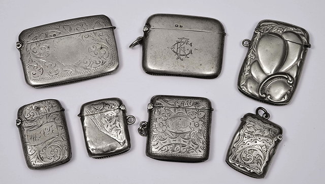 Appraisal: A COLLECTION OF SIX VARYING SILVER VESTA CASES and a