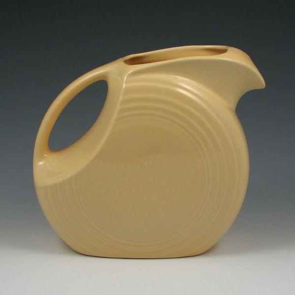 Appraisal: Fiesta large disc pitcher in new Yellow discontinued color in