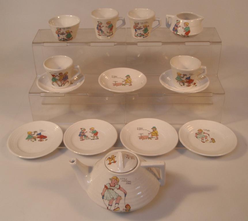 Appraisal: A 's Art Deco nursery tea set comprising four cups