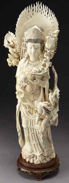 Appraisal: Chinese carved ivory Guanyin with two International buyers should note