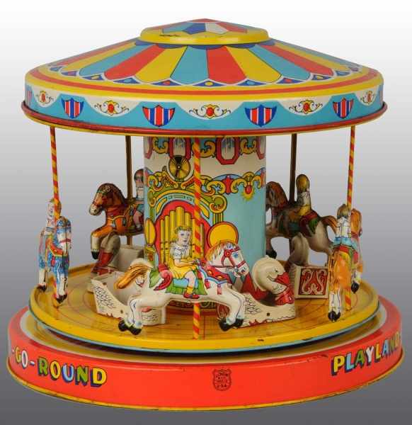 Appraisal: Tin Chein Merry-Go-Round Wind-Up Toy Description American Working Swan chariot