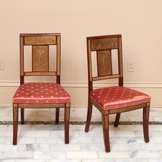 Appraisal: Pair Empire bronze mounted mahogany chairs Pair Empire bronze mounted