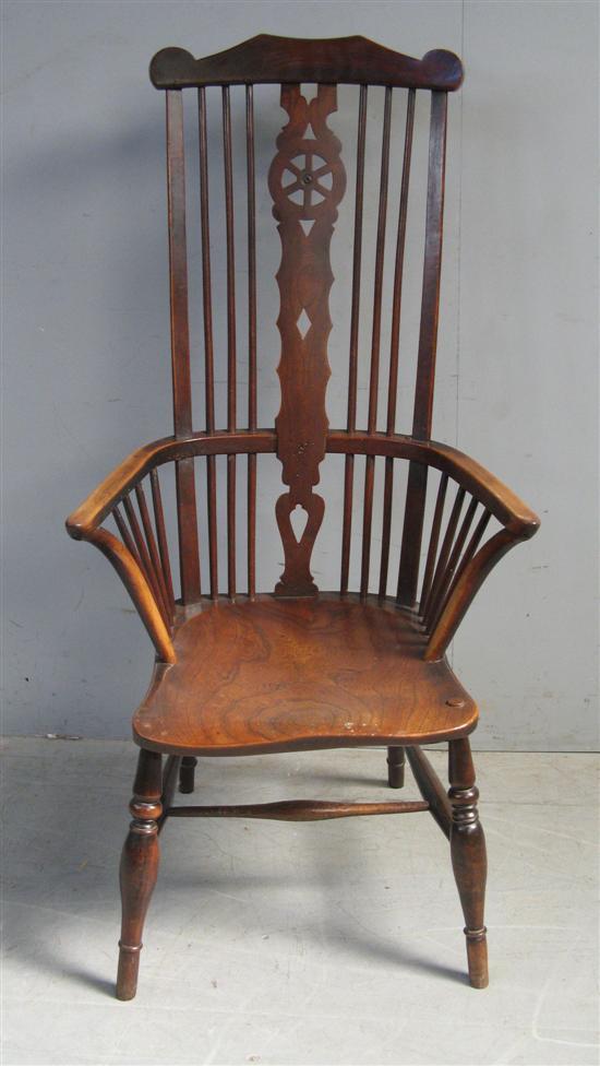 Appraisal: th Century oak and elm Windsor wheel back armchair on