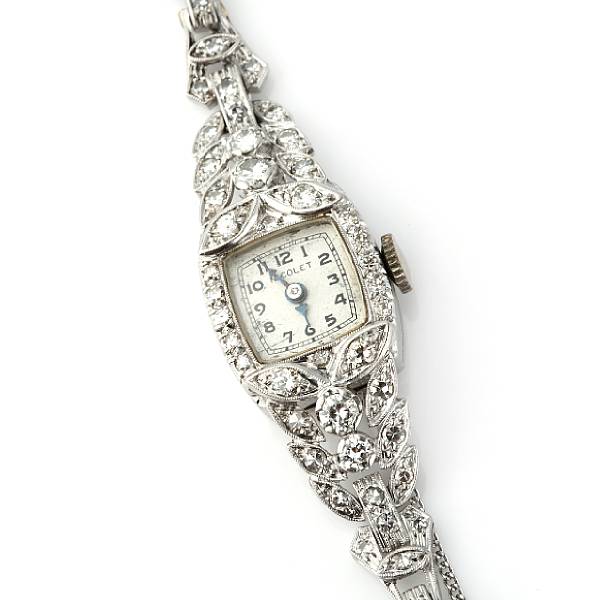 Appraisal: An Art Deco diamond onyx and platinum wrist watch Nicolet