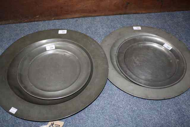 Appraisal: A LARGE ANTIQUE PEWTER CHARGER diameter a further pewter charger