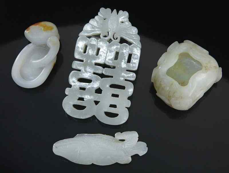 Appraisal: Chinese Qing jade carvings jade plaque carved in the shape