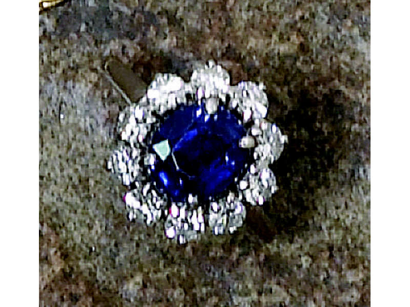 Appraisal: SAPPHIRE AND DIAMOND RING Platinum ballerina style with an oval