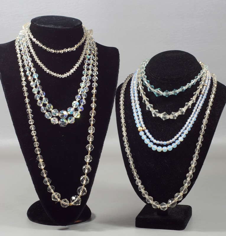 Appraisal: clear or opalescent glass bead necklaces longest