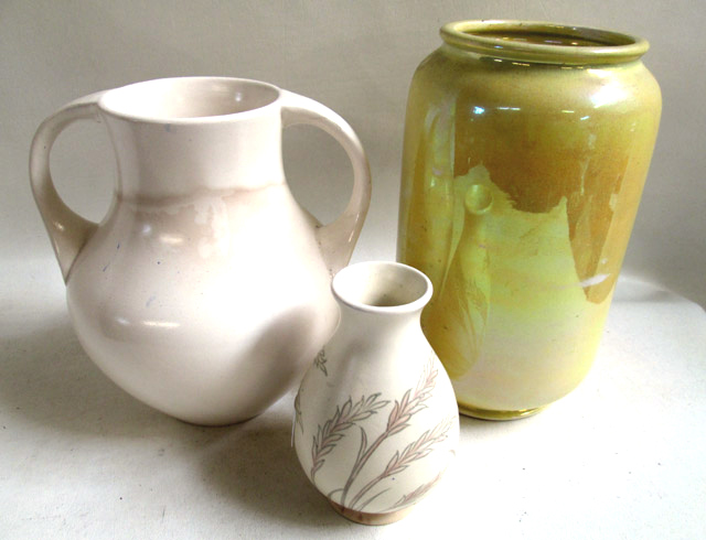 Appraisal: THREE MOORCROFT POTTERY VASES of yellow and cream glaze Each