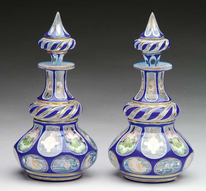 Appraisal: FINE PAIR OF THREE-COLOR OVERLAY DRESSER BOTTLES Clear to white